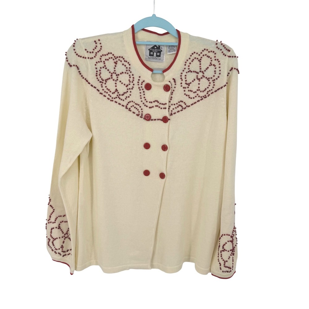 Storybook Knits Cream Cardigan with Red Trim and Embellishment